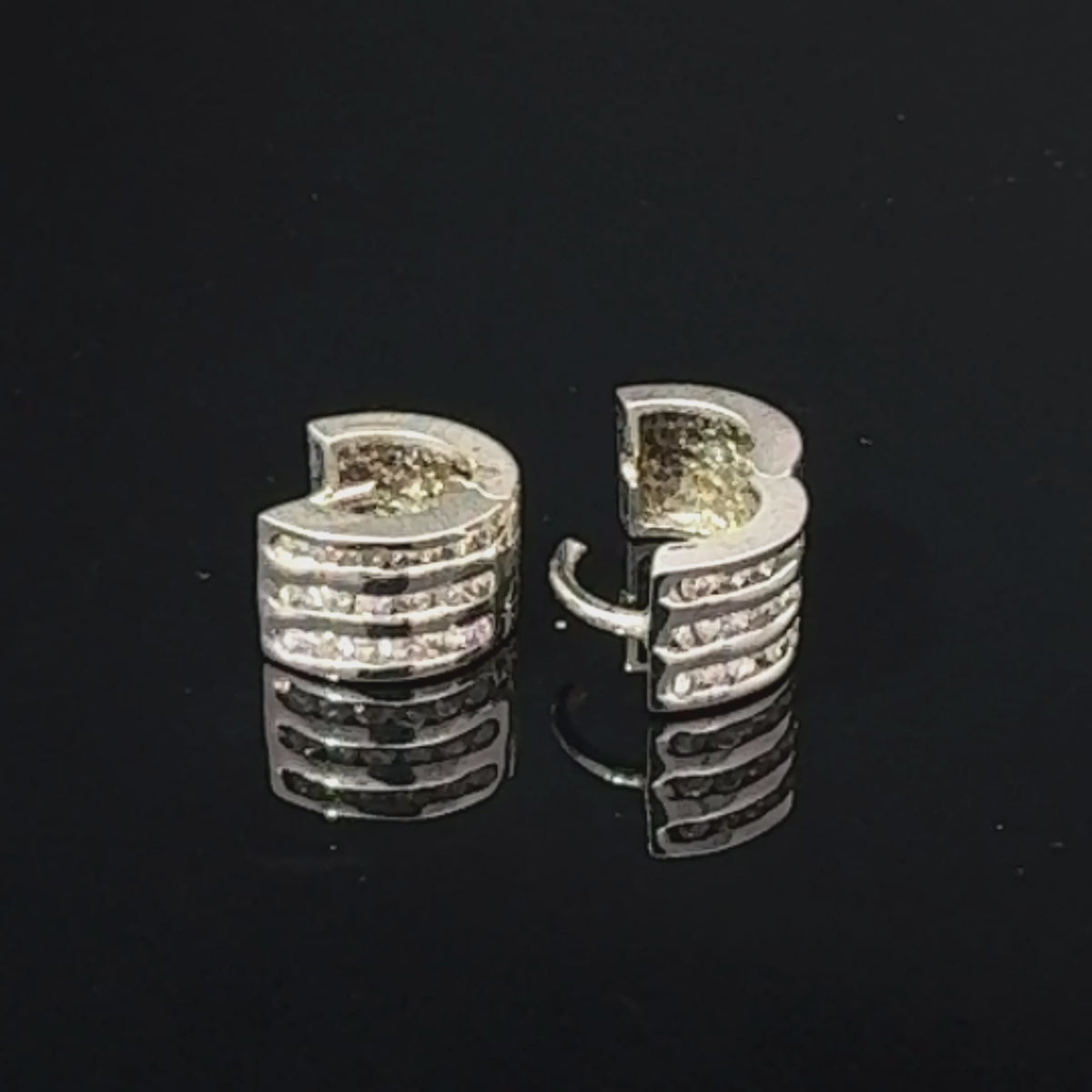 14K White Gold Cubic Zirconia Huggie Hoop Earrings — video 1 of 1