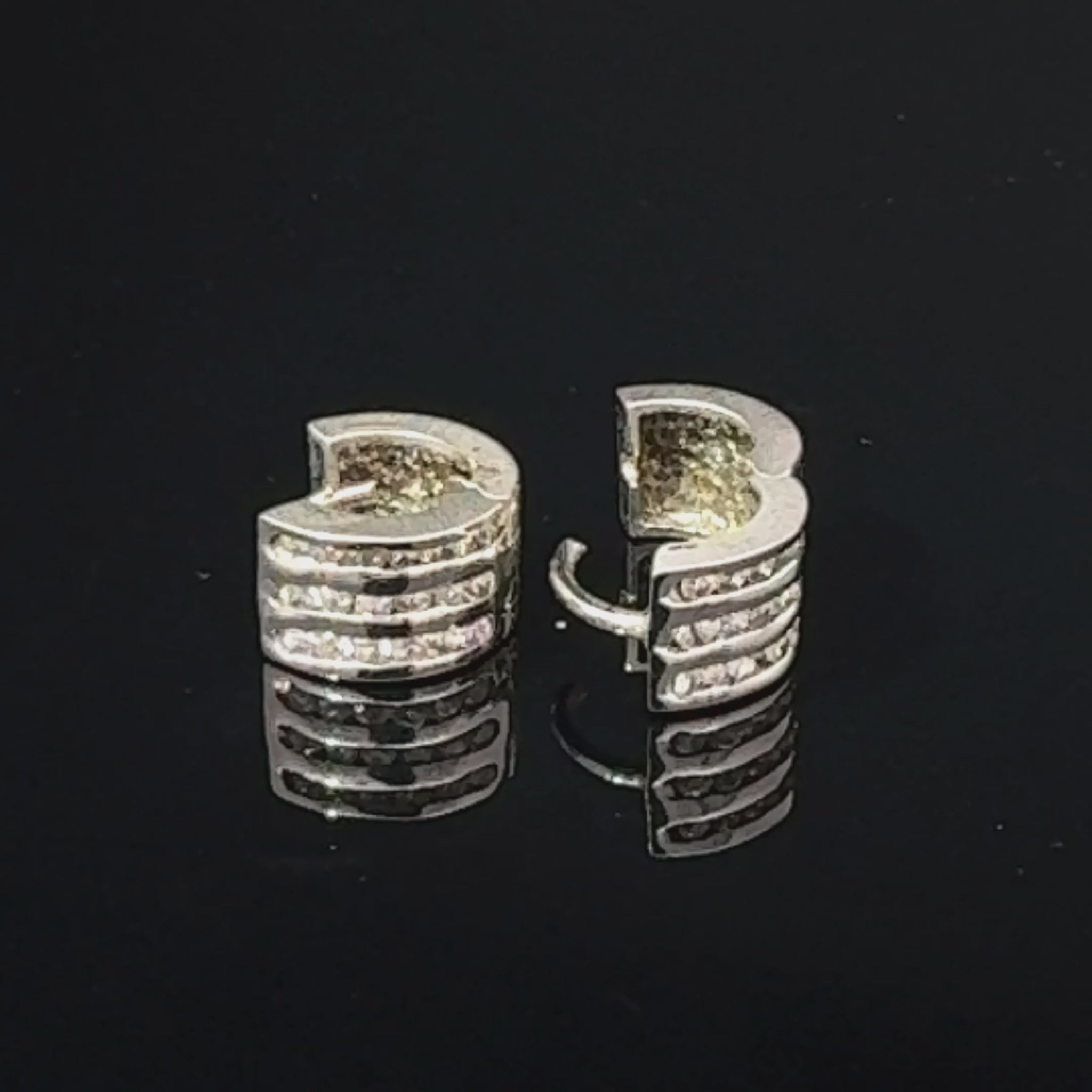 14K White Gold Cubic Zirconia Huggie Hoop Earrings — video 1 of 1
