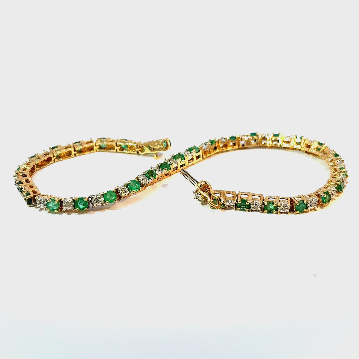 14K Yellow Gold Emerald and Diamond Tennis Bracelet, 7 Inches — video 1 of 1