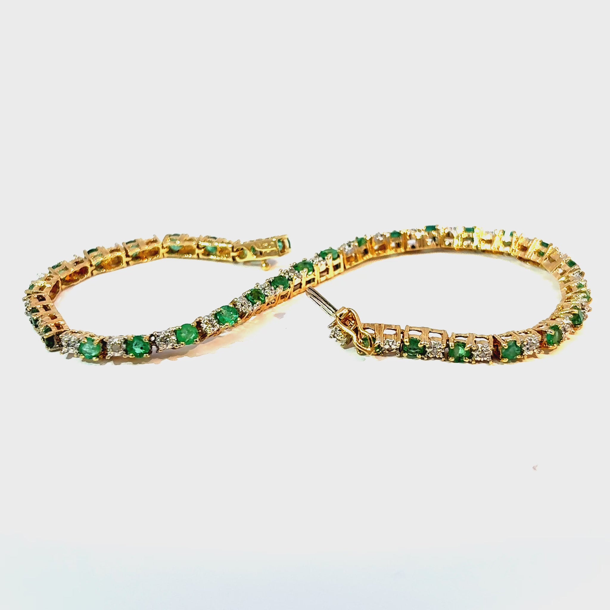 14K Yellow Gold Emerald and Diamond Tennis Bracelet, 7 Inches — video 1 of 1